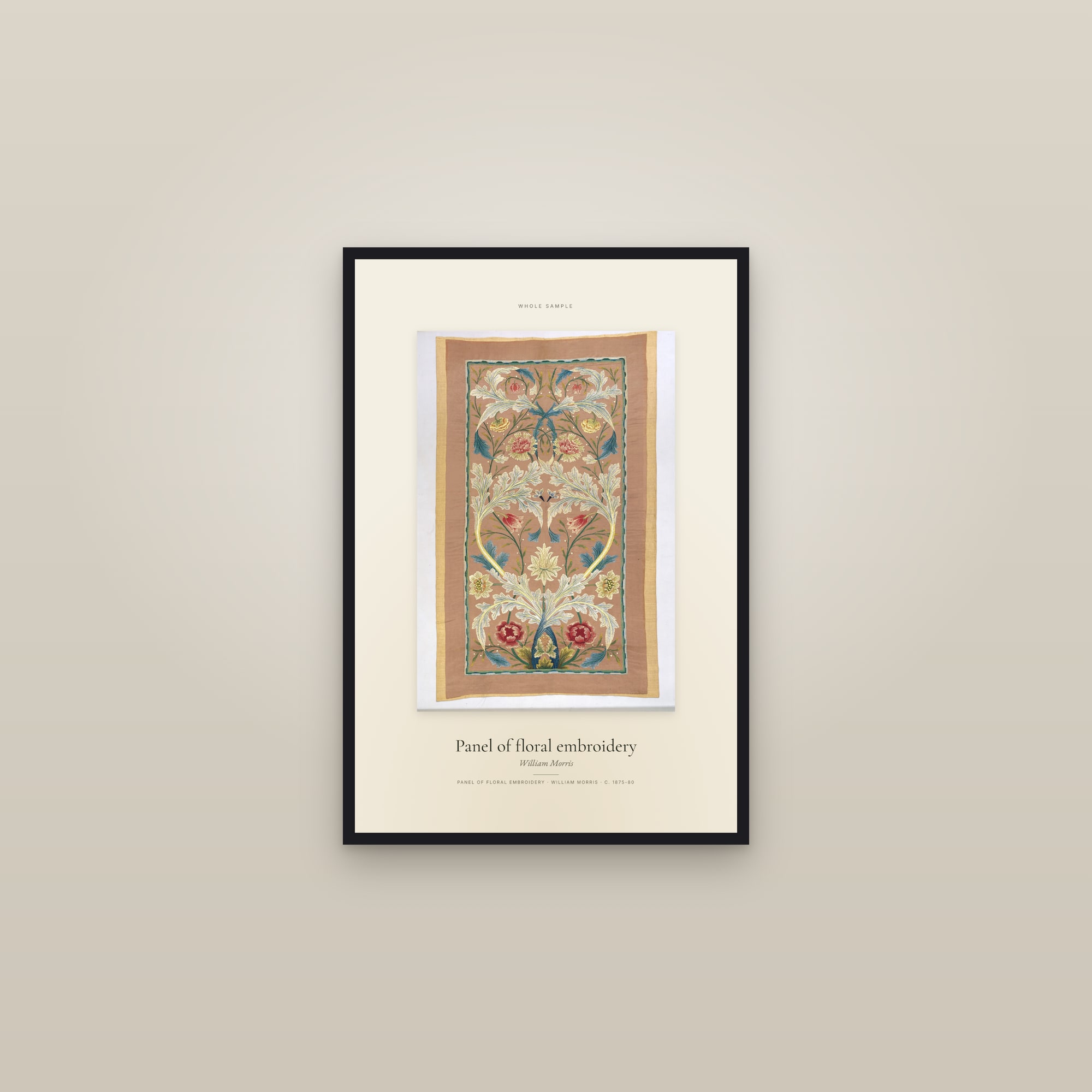 Panel of floral embroidery — framed in a gallery setting