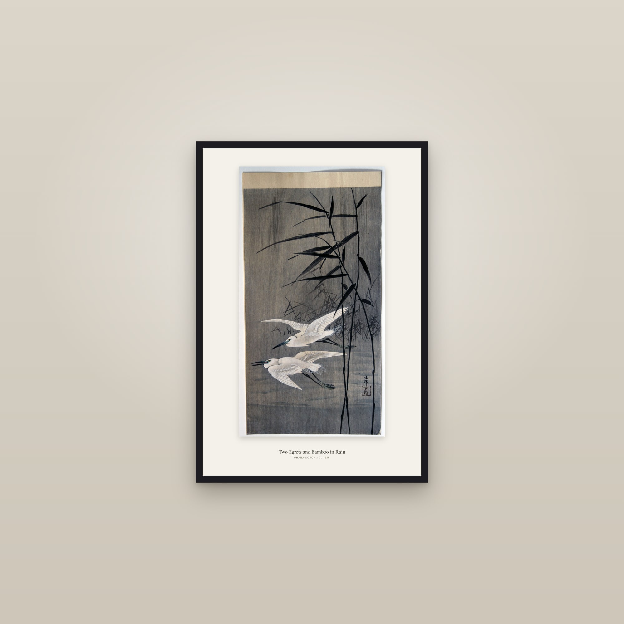 Two Egrets and Bamboo in Rain — framed in a gallery setting