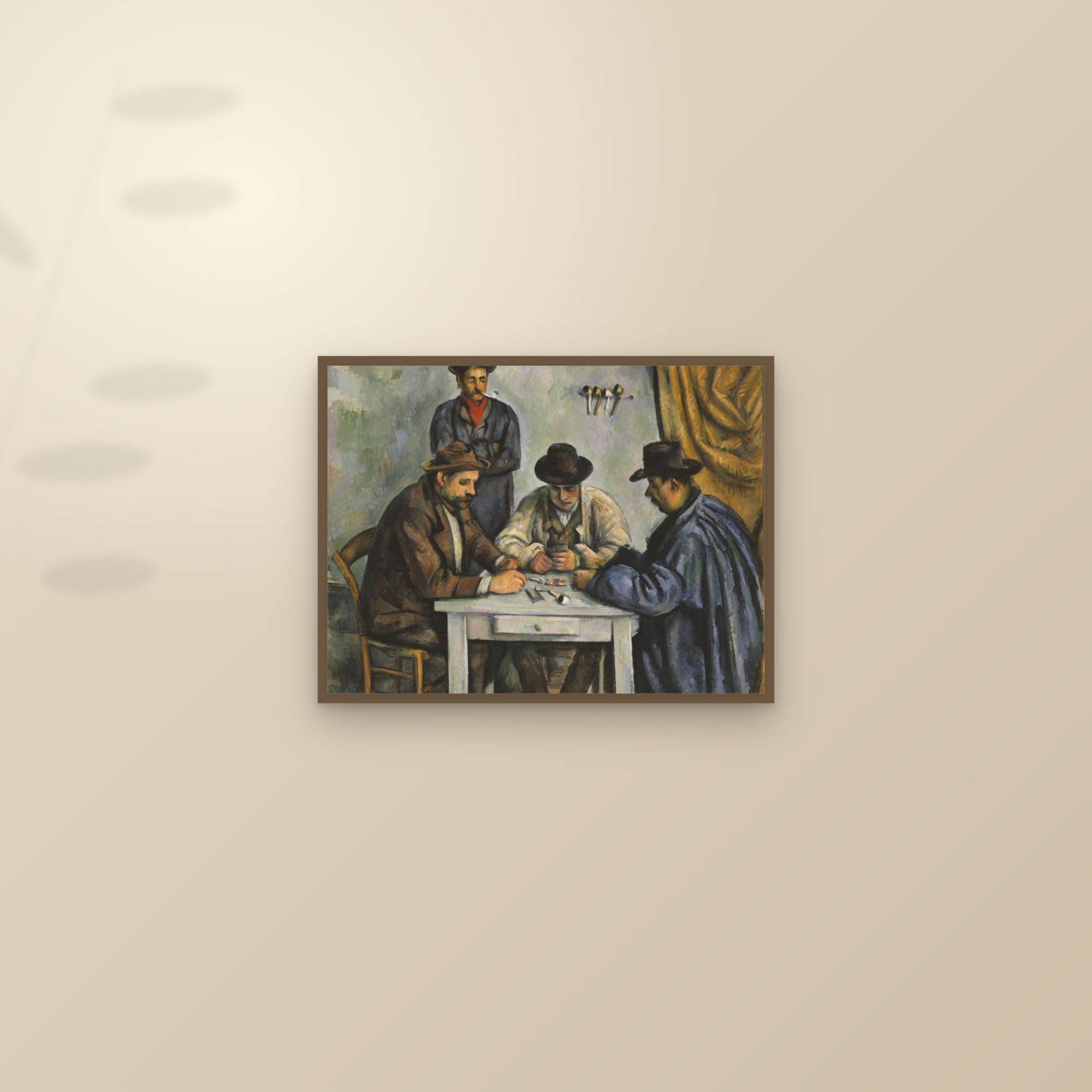 The Card Players (Full) — Full-Bleed Edition — framed and styled on a sunlit wall