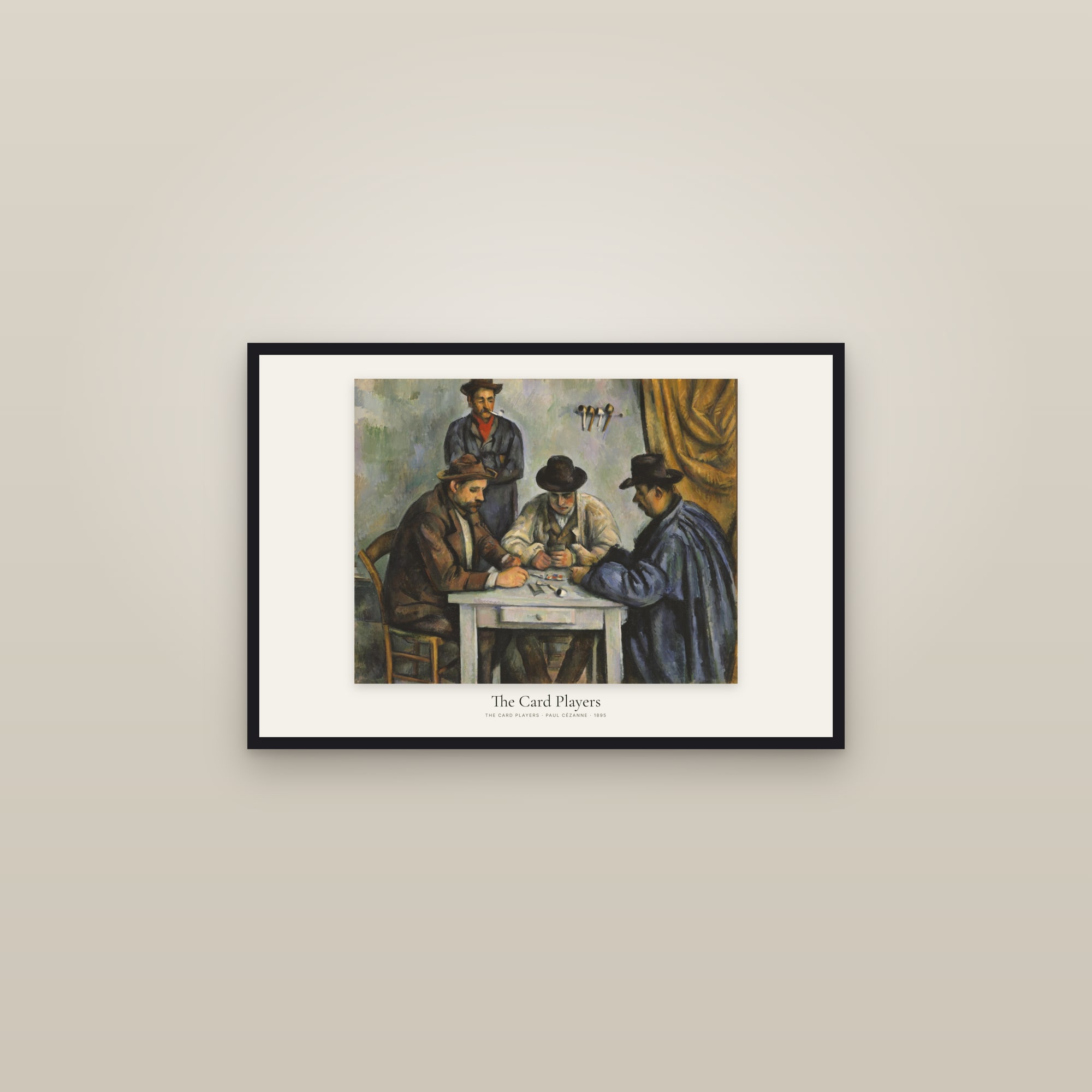 The Card Players — framed in a gallery setting