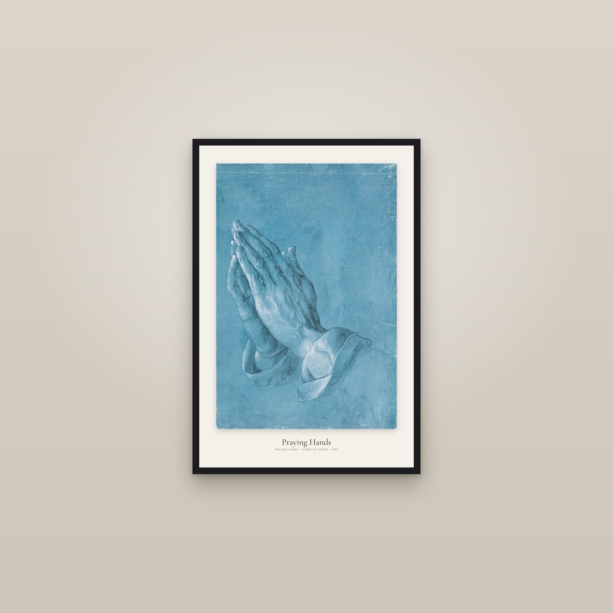 Praying Hands — framed in a gallery setting