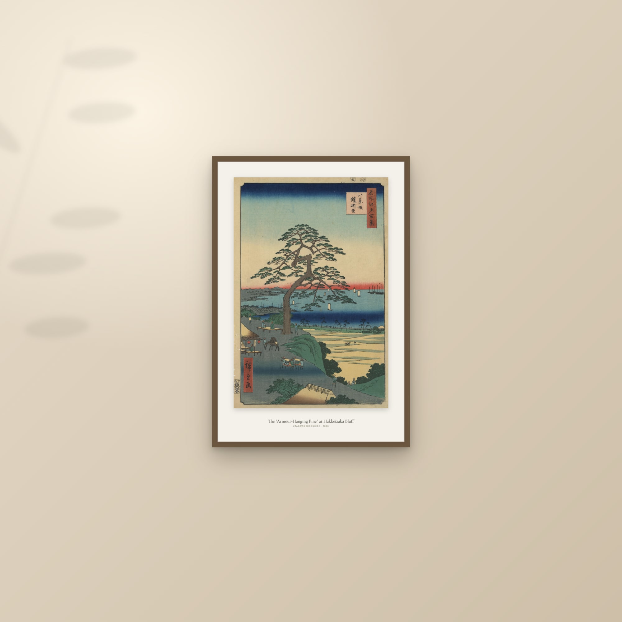 The "Armour-Hanging Pine" at Hakkeizaka Bluff — framed and styled on a sunlit wall