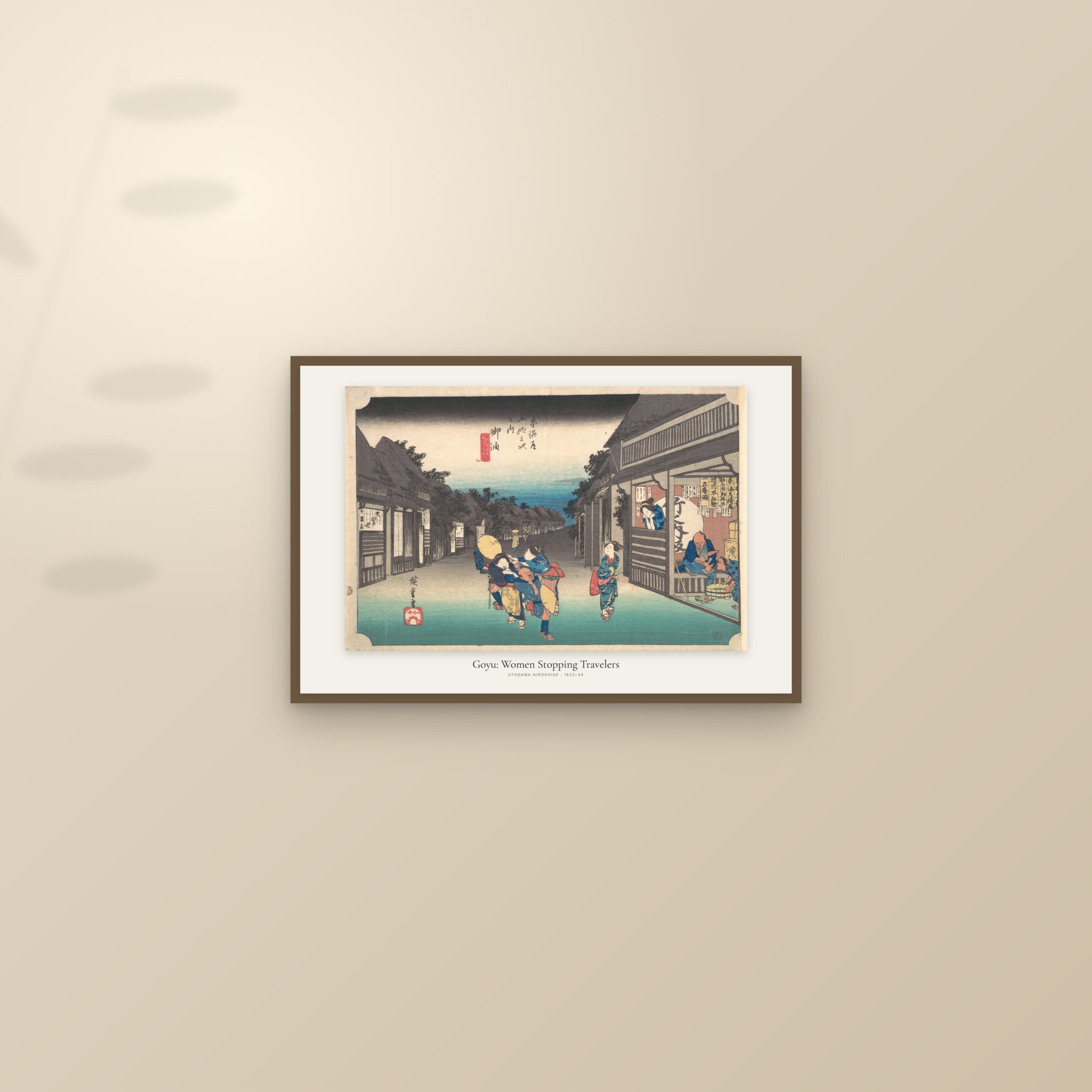 Goyu: Women Stopping Travelers — framed and styled on a sunlit wall