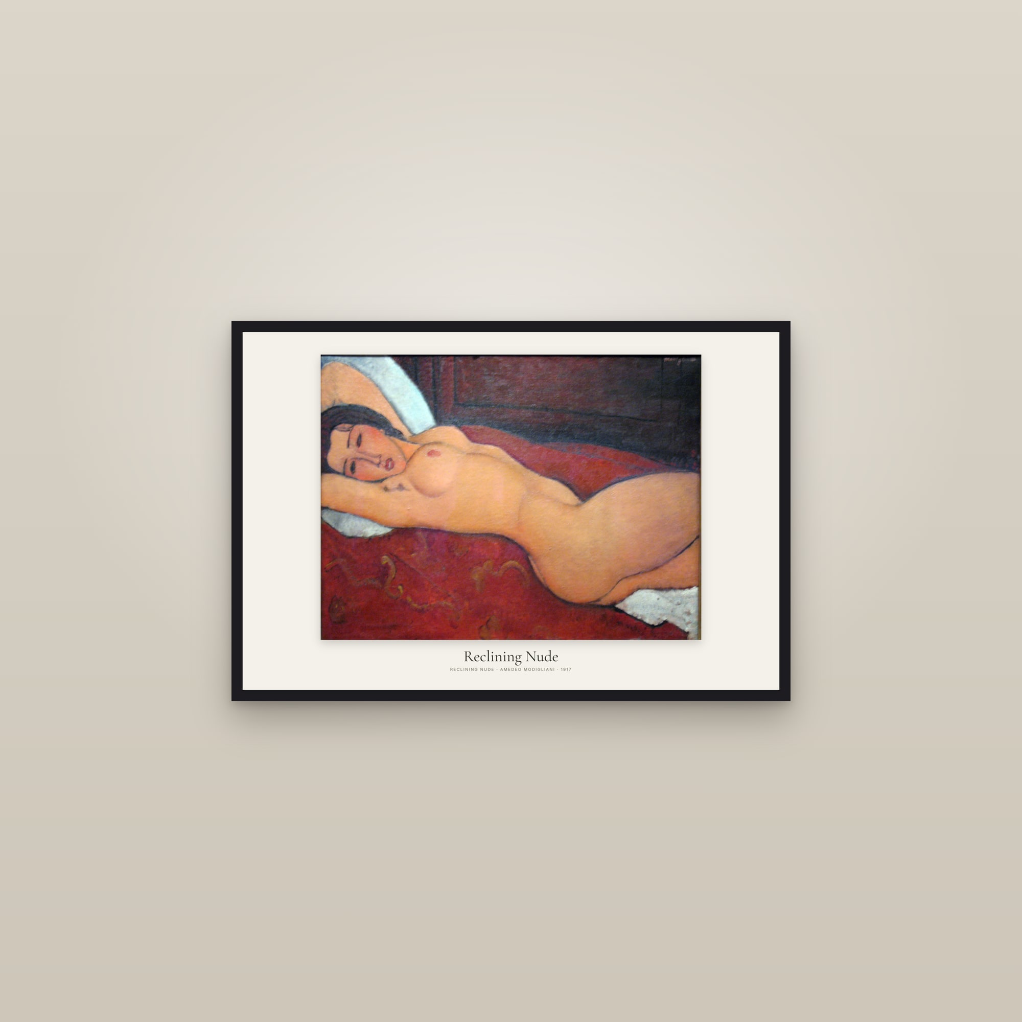 Reclining Nude — framed in a gallery setting