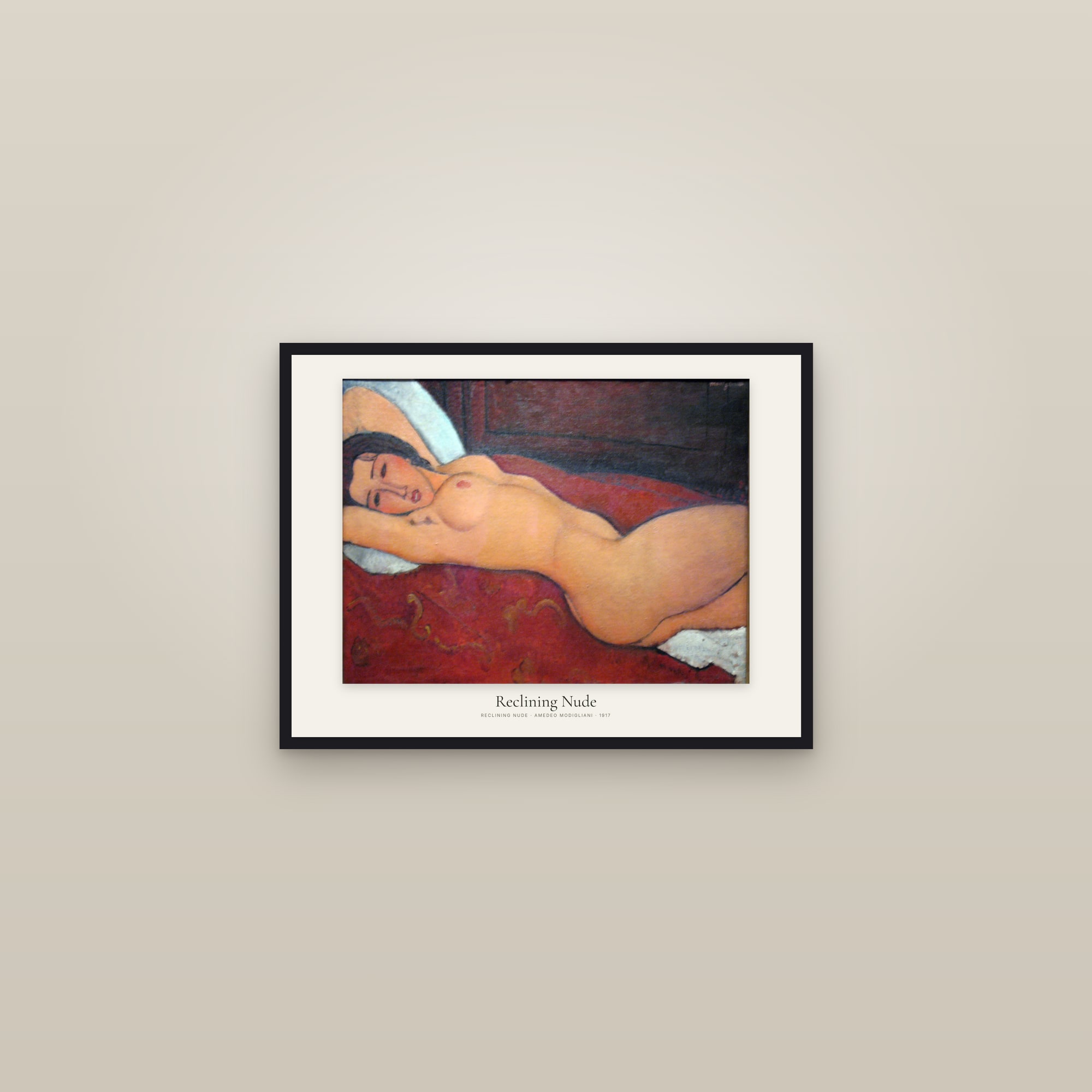 Reclining Nude — framed in a gallery setting