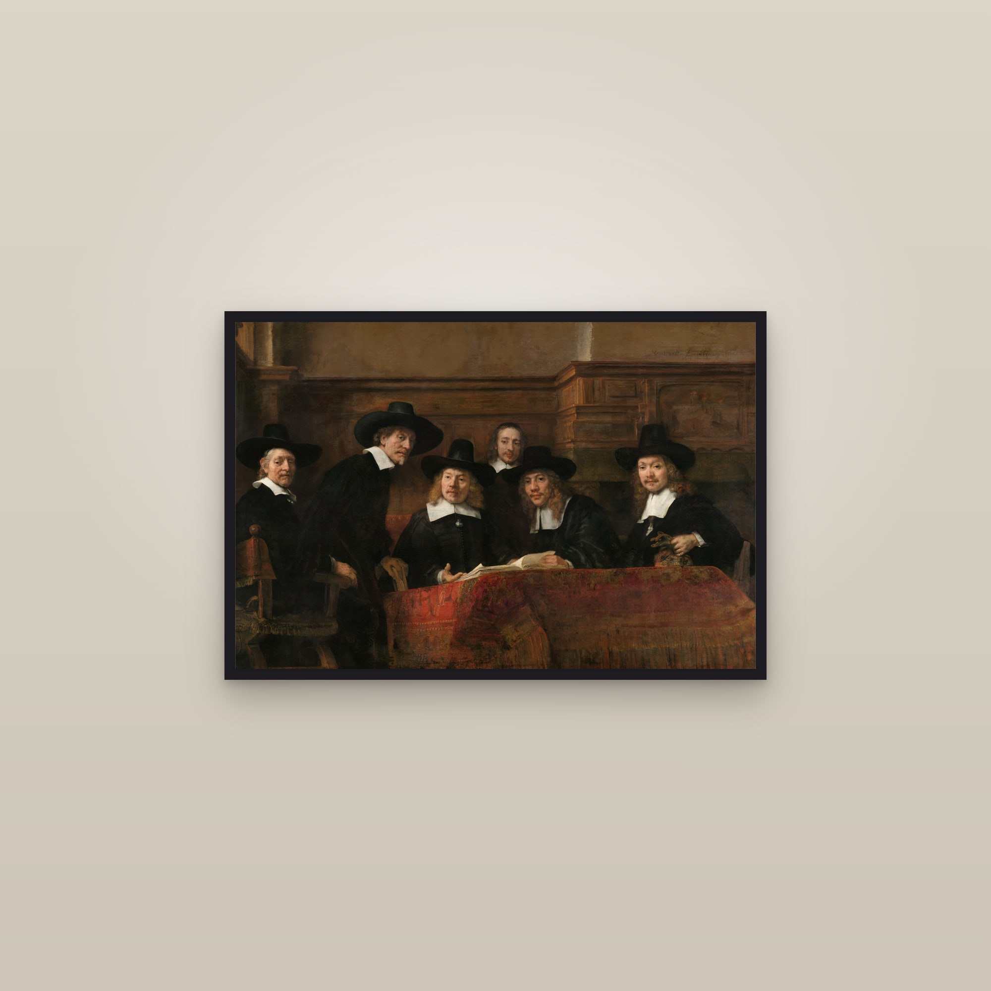 The Syndics of the Drapers' Guild (De Staalmeesters) — Full-Bleed Edition — framed in a gallery setting