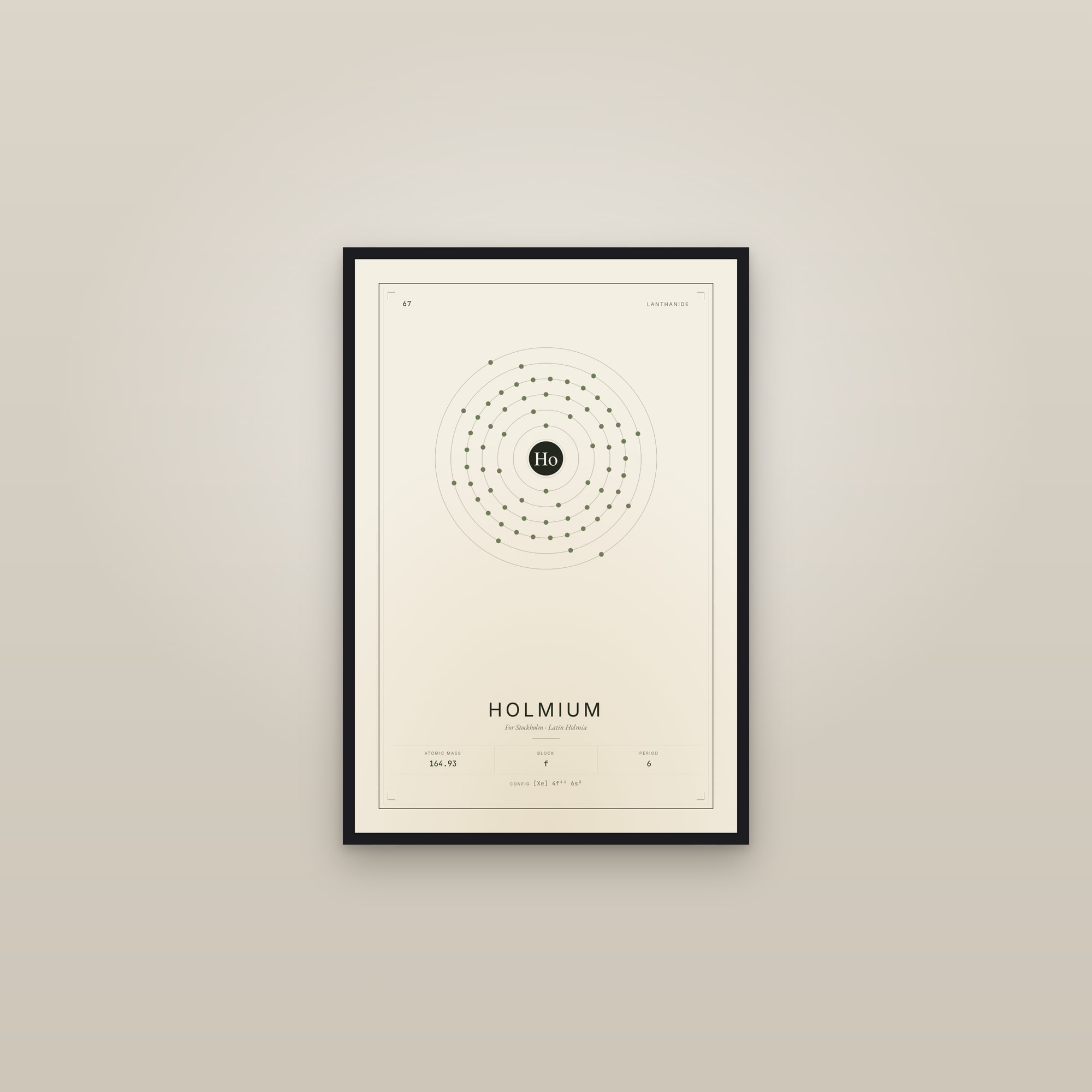 Holmium — Element No. 67 — framed in a gallery setting