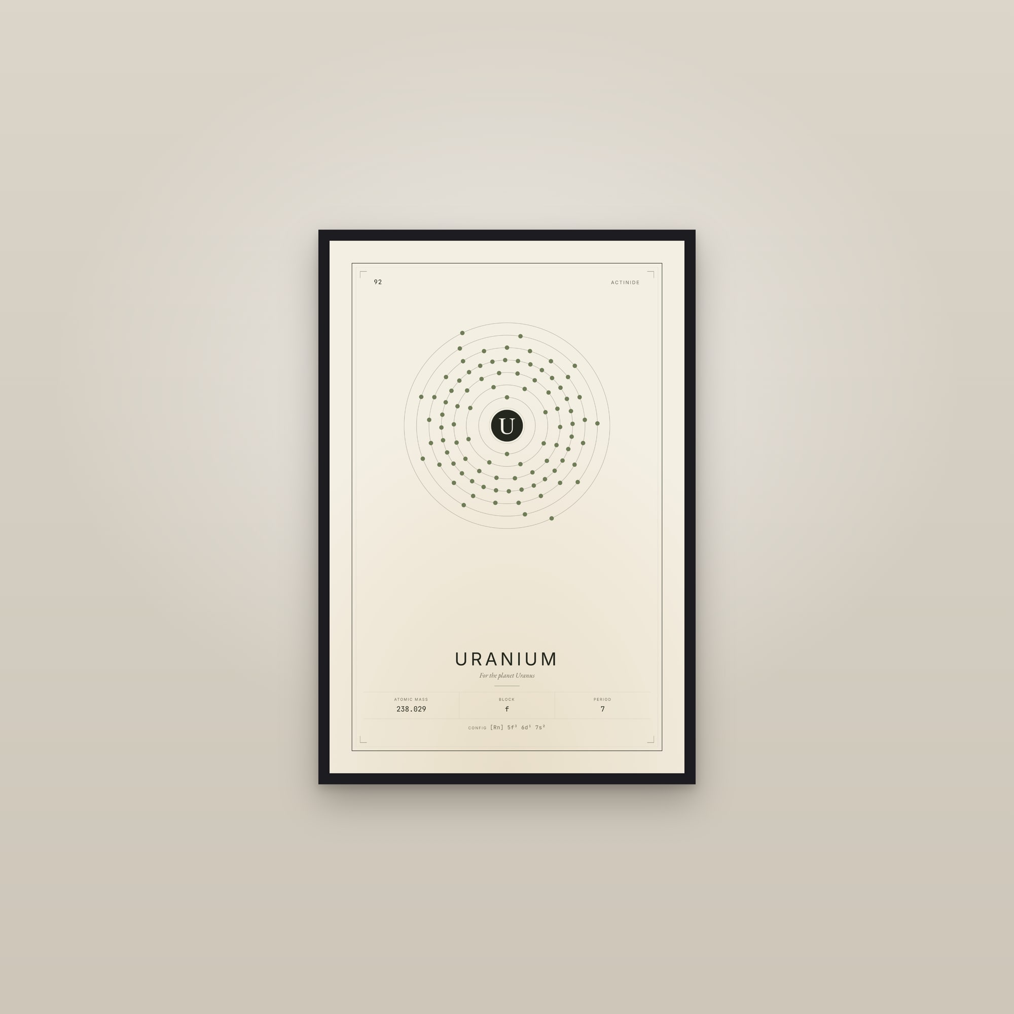 Uranium — Element No. 92 — framed in a gallery setting